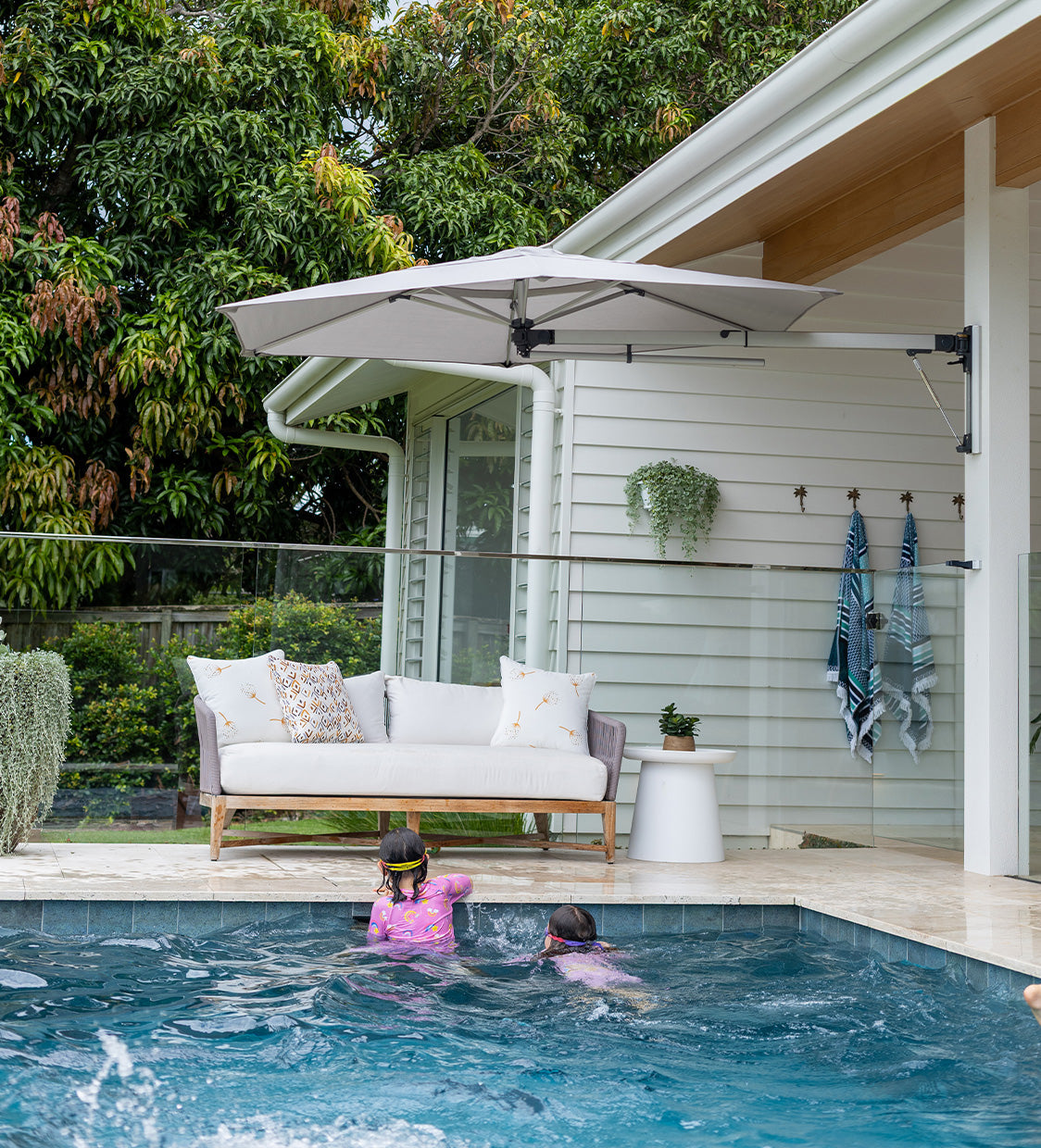 Enhance Your Patio With a Wall Mounted Umbrella