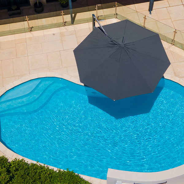 Jump into these backyard pool ideas for 2026