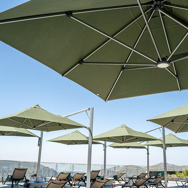 Outdoor design for hotels with cantilever umbrellas