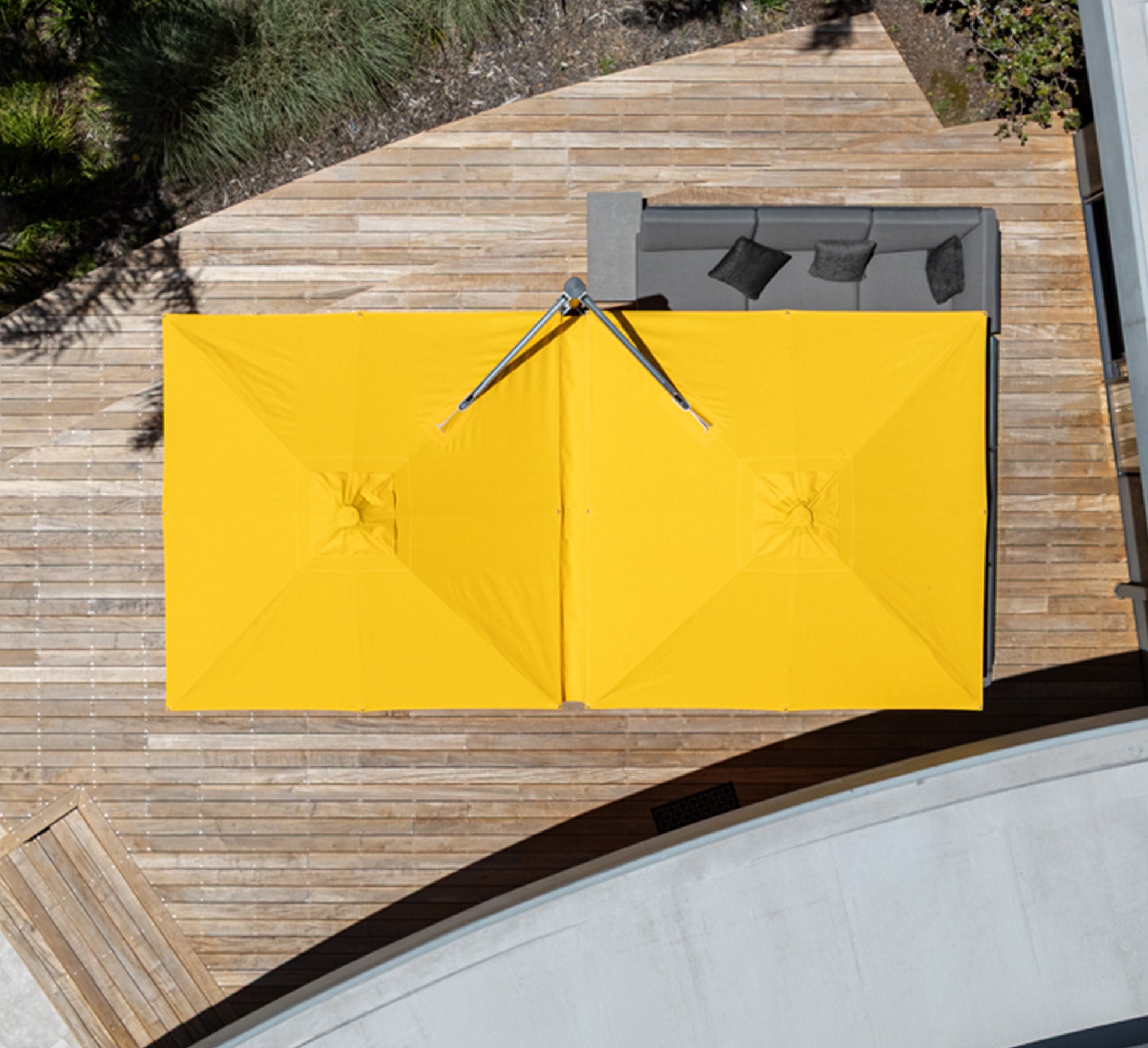 Yellow outdoor canopy on a wooden deck