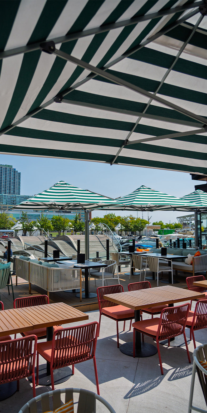 cafe patio umbrellas Printed Market Umbrella Frame and Canopy / 22lb Heavy Duty Base & Waterbag Pair with our 25kg Clamshell Base for secure support. The Power Of Patio Umbrellas